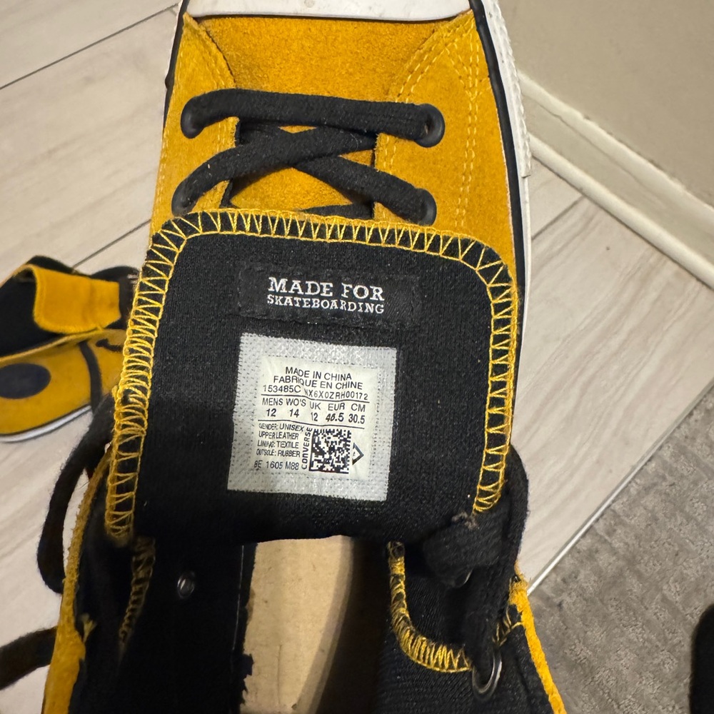 Converse Yellow and Black Athletic Shoes